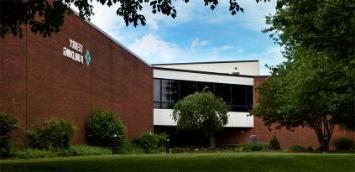 Delaware Tech Dover Campus building sign of logo.